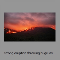 strong eruption throwing huge lava shreds till caldera wall